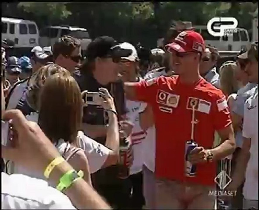Kimi Räikkönen and Michael Schumacher joking 2006