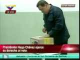 President Hugo Chavez casts his ballot in Venezuela's election