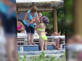 Kelly Osbourne Shows Off Her Curves in a Bright Neon Green Bikini