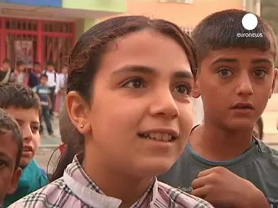 Turkey vows to retaliate after Syrian shells hit border town