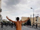 Protester Runs Stark Naked Through Violent Clashes