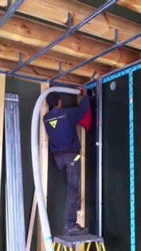 Maison BBC en ossature bois isolée avec de la ouate de cellulose par insufflation