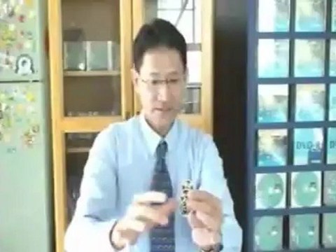 Spectacular Eisenhower Dollar (Gimmicks with DVD) by Johnny Wong - Magic Trick