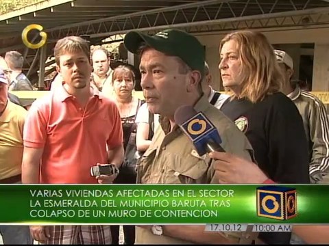 Cuatro familias afectadas y 10 vehículos tapiados dejó colapso de un muro en Baruta