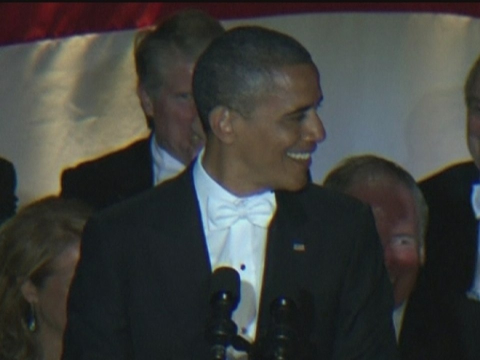 Mitt Romney and Barack Obama trade jokes at cha...