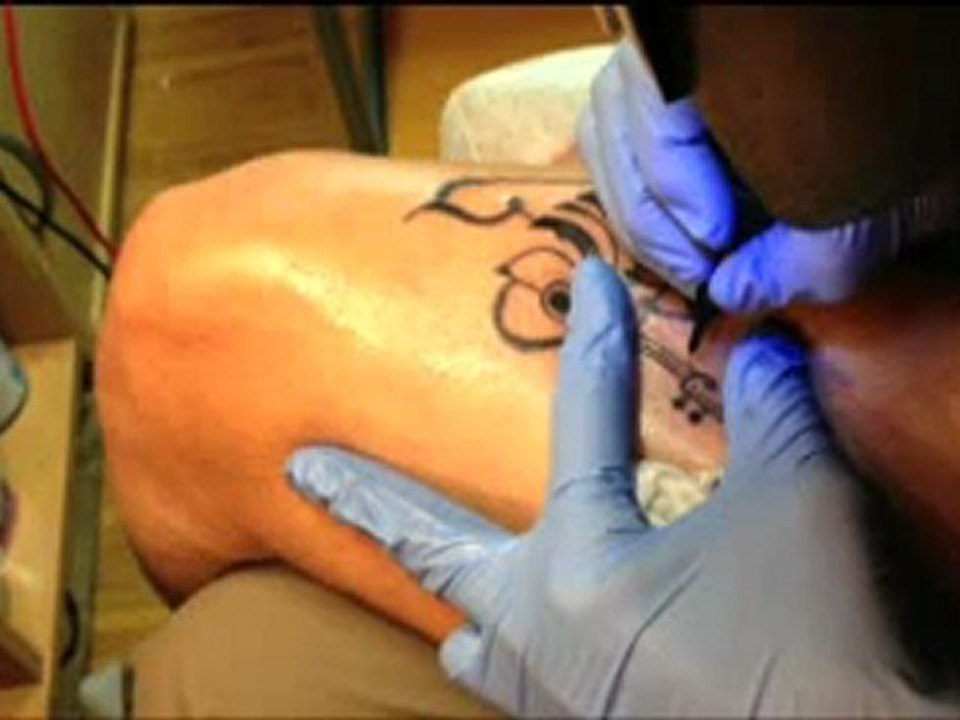 Tattoo papillon musical