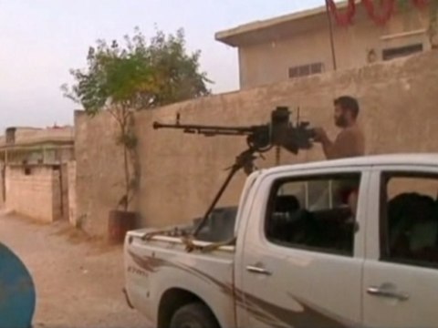 Syrian rebels besiege pro-Assad forces near Turkish border