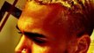 Un león ruge ahora en el cuello de Chris Brown
