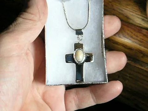 Sterling hollow cross W faceted ethiopia opal