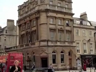 Daredevil on third-floor ledge without safety