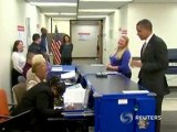 Obama votes early as he is urging others to do