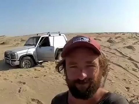 Natural nude surfing somewhere in Angola