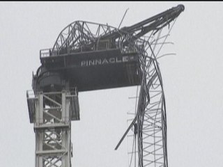 Crane collapses and front of building torn off in New York