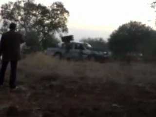 Syrian rebels battle governnent forces for military airport