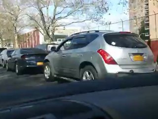 Vehicles line up to fill up gas, Forest Hills Mobil gas station