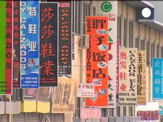 Chinese businesses strike in Spain after police raids