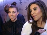 Kardashian sisters Kim and Kourtney celebrate new fashion line in London