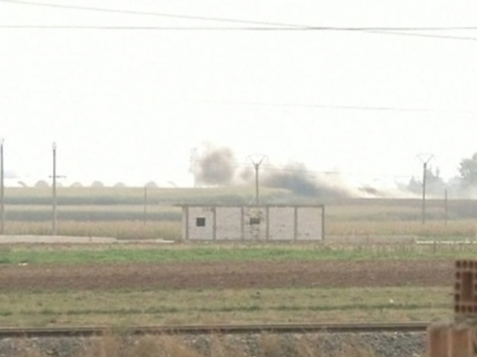 Captured Syrian border town is bombarded