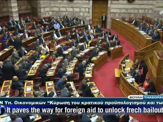 Greece eyes fresh bailout funds after budget passed