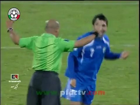 player tries to celebrate with the referee after final whistle