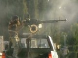 Rebels under fire in Syria as they claim government complex