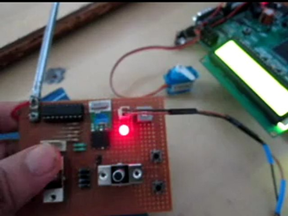 VHDL & FPGA Project : ANGLE CONTROL OF SERVO MOTOR using WIRELESS RF TECHNOLOGY with LCD Display.