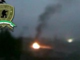 Rebels battle into the night to control military base just outside Damascus.