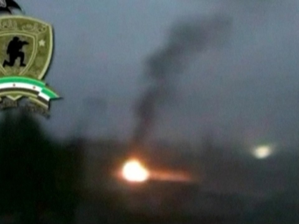 Rebels battle into the night to control military base just outside Damascus.