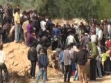 Palestinians bury victims of Israeli attacks