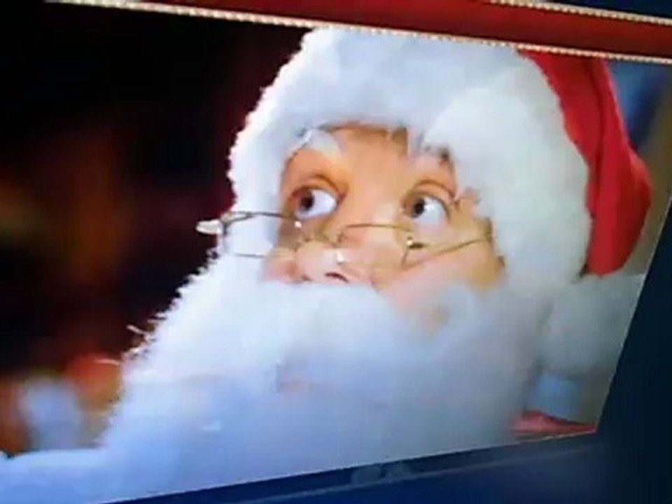 Cameron regarde le message du père noël