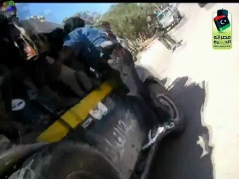 Kadhafi aux mains des miliciens