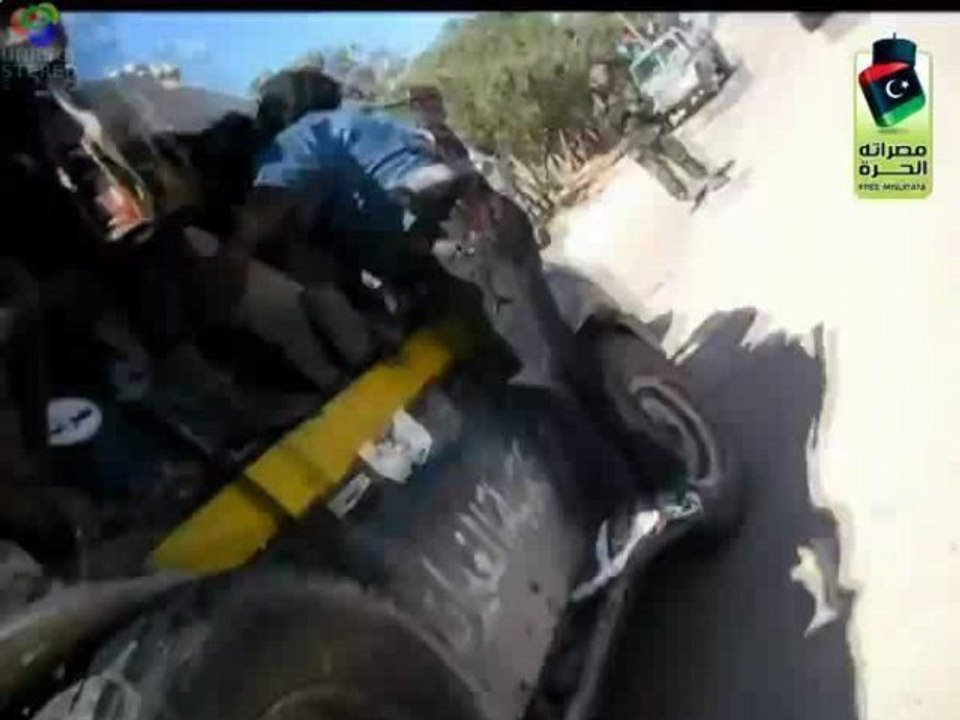 Kadhafi aux mains des miliciens