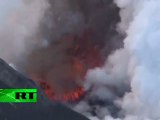 Iceland volcano spitting lava and smoke, less ash after eruption