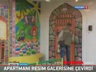 Yaşadığı apartmanı resim galerisine çevirdi