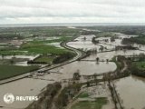 Floods spread across UK