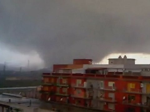 AMAZING PICTURES: Tornado rips through steel plant in Italy