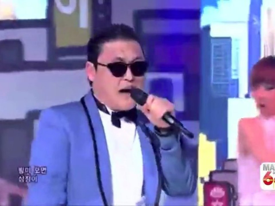 PSY chante le Poussin Piou