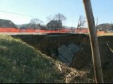 A pond turns into a huge sinkhole