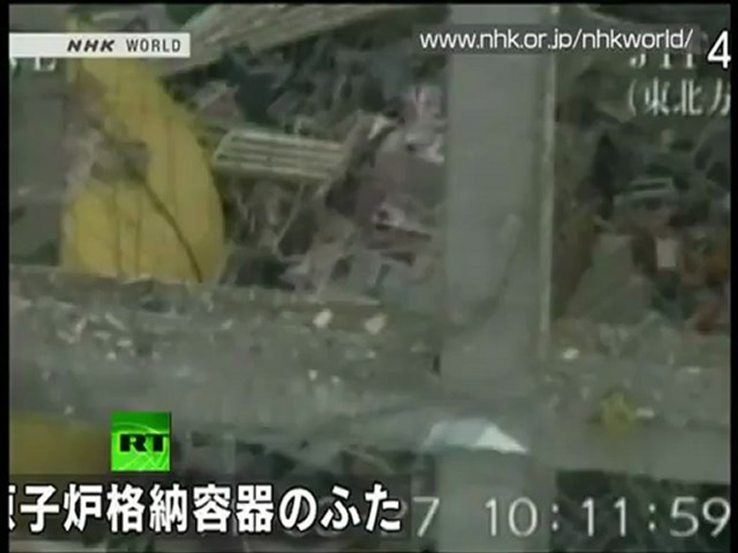 Latest helicopter footage of Fukushima, zoom-in on ruined reactors