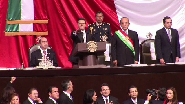 Mexico's Nieto sworn in as president amid protests