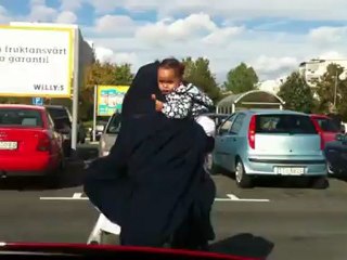 Muslim woman in Sweden dressed in religious masking-clothes