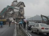 China Hammers Down Nail House in the Road