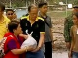 Philippines buries dead from Typhoon Bopha