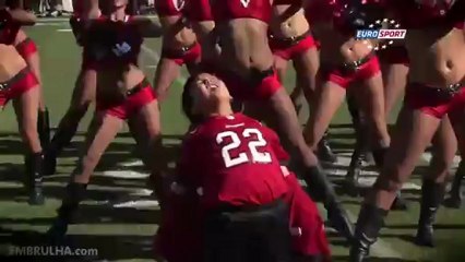Fat kid dancing with Cheerleaders