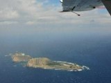 China defends flight over disputed island