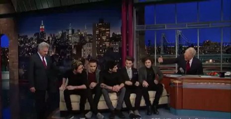 Dustin Hoffman smooches Niall Horan as One Direction appear on Letterman.