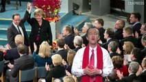 Merkel, Montebourg et Berlusconi : les photos de la semaine / 14 décembre 2012