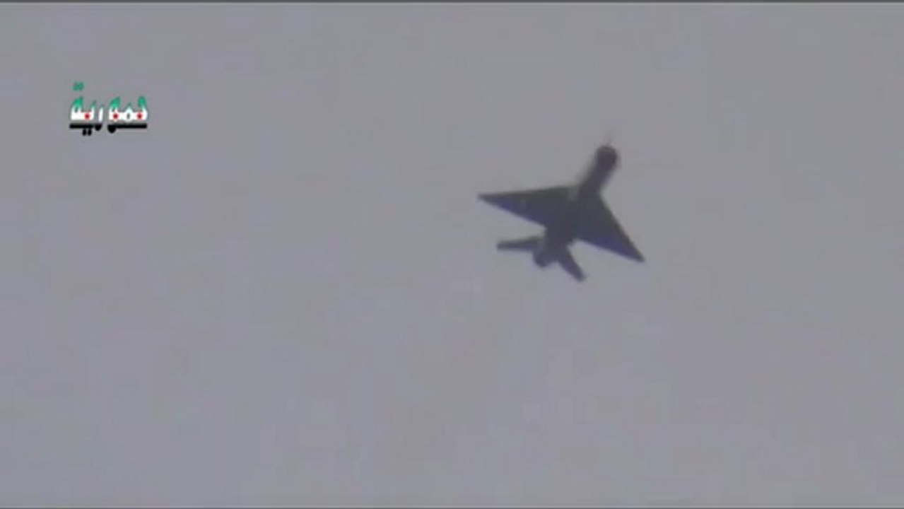 Syrian Assad Mig-21 Dropping Two Bombs on Rebels