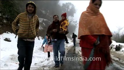 1955.Tourists playing with snow in Mayodia.mov