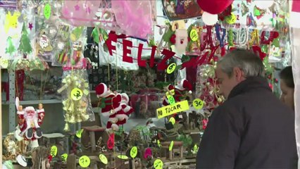 Spaniards tighten their belts for crisis Christmas